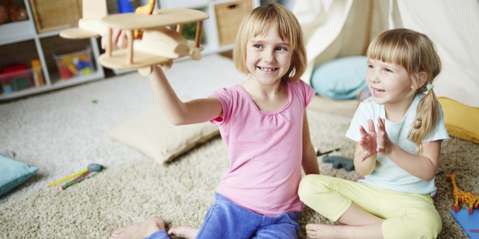 two happy children in home